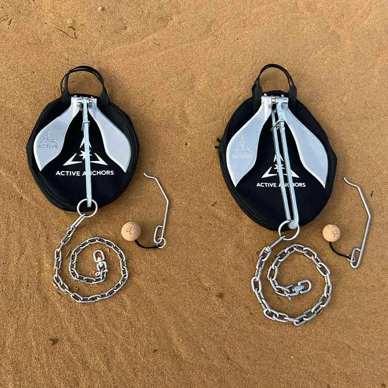 Two differently sized Active Anchors laid out on their bags with associated fittings.