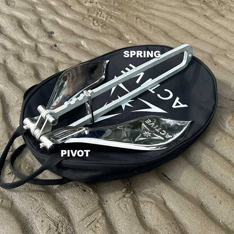 Active Anchor on its bag with spring and pivot movement marked by arrows.