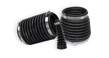 A close view of black, accordion‑like sterndrive bellows with clamps at each end