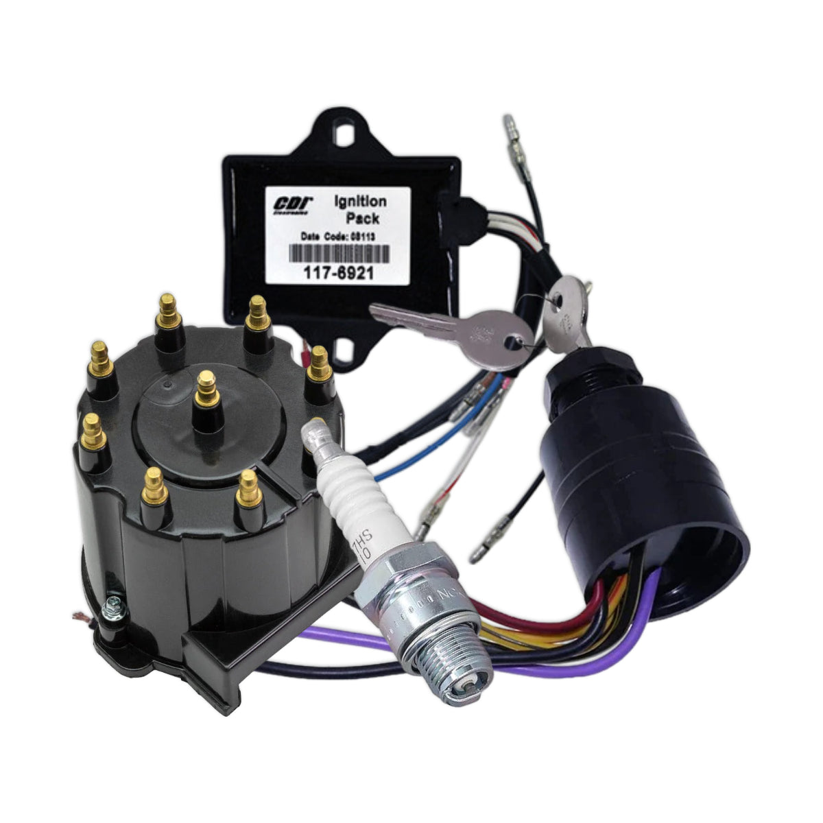 A distributor cap sat beside a spark plug and a key switch.
