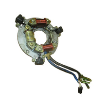 Image of a coil style outboard engine alternator on a white background.