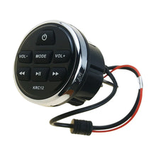 Image of a round marine audio control panel on a white background.