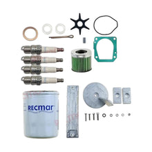 Image of various engine service and maintenance parts on a white background.