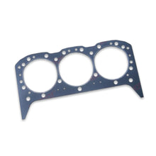 Grey headgasket for a three cylinder engine on a white background.