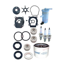 Image of various engine service and maintenance parts on a white background.