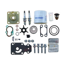 Image of various engine service and maintenance parts on a white background.