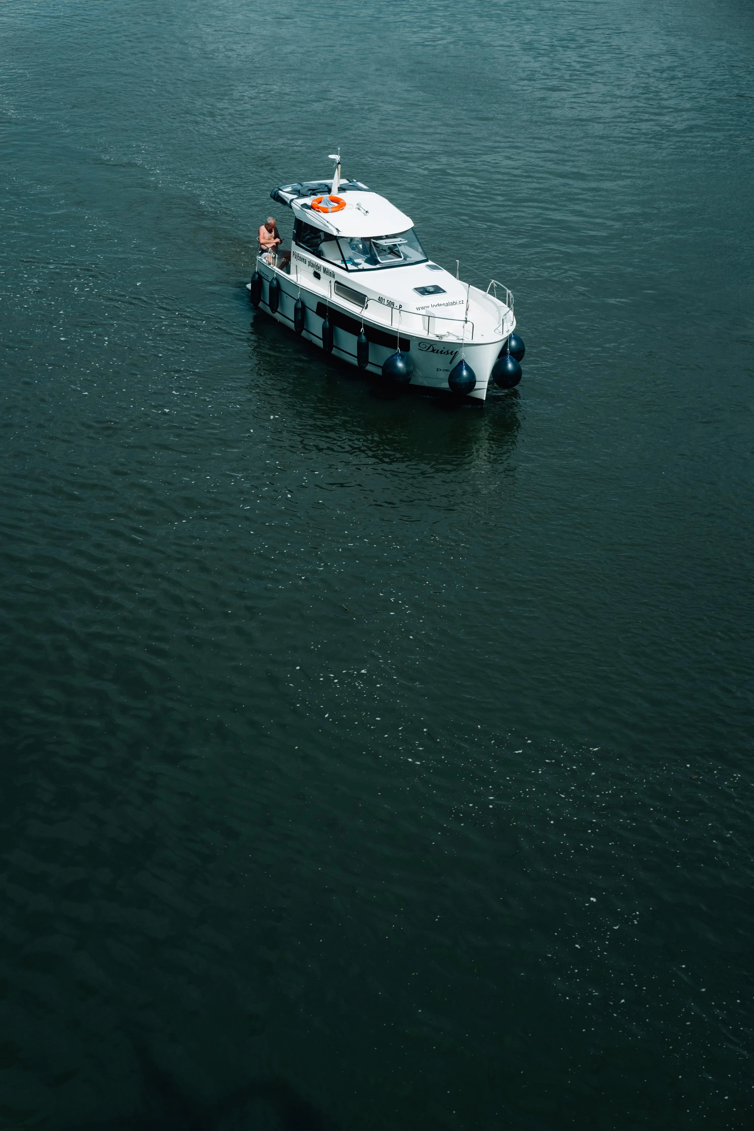 White boat on a body of water